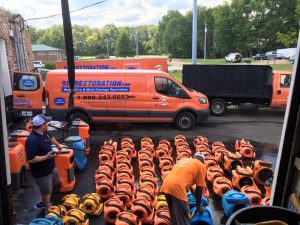 Technicians Preparing for a Water Damage and Mold Restoration Job